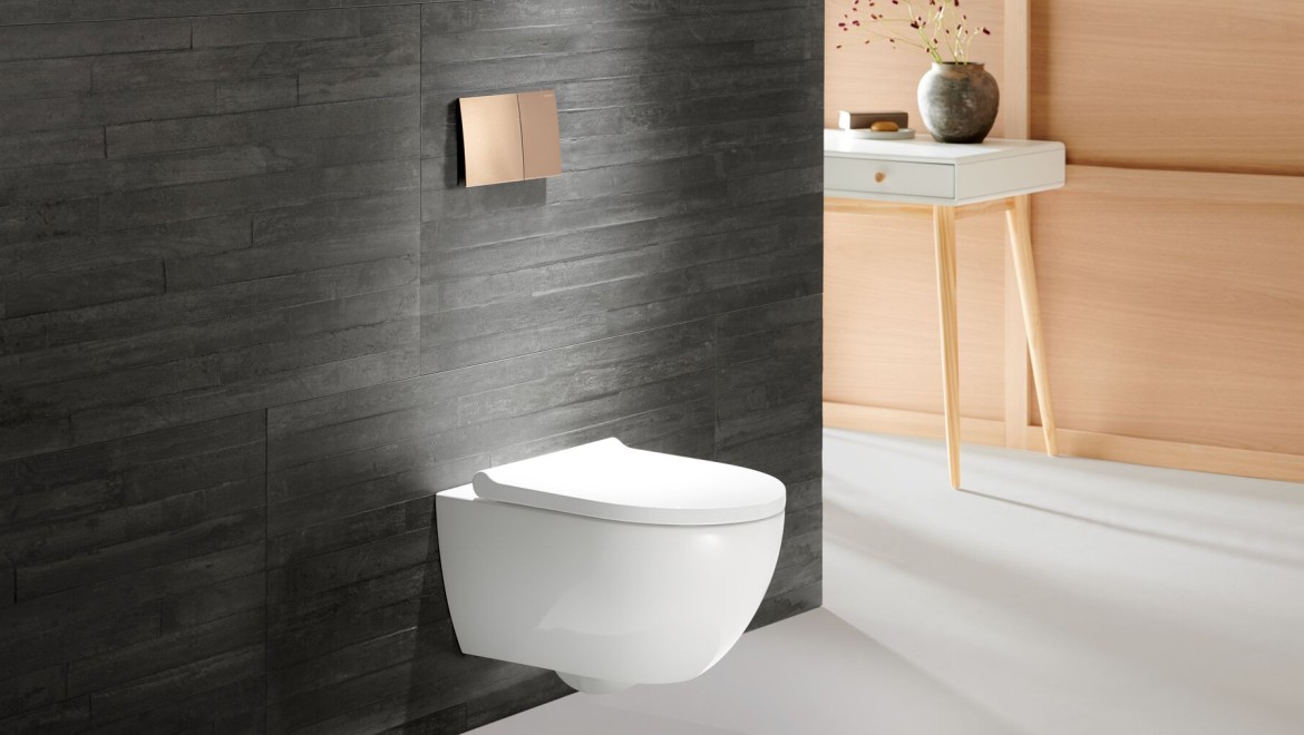 Geberit WC Acanto avec plaque de déclenchement Geberit Sigma70 en or rose