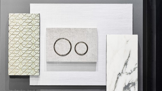 La plaque de déclenchement Sigma21 aspect béton avec anneaux design chromés La plaque de déclenchement Sigma21 aspect béton avec anneaux design chromés