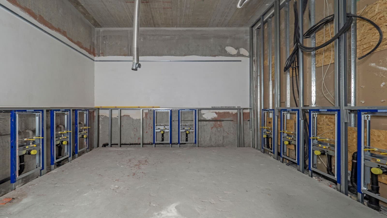 L’installation sanitaire de la halle 12 à l’étape du gros œuvre L’installation sanitaire de la halle 12 à l’étape du gros œuvre